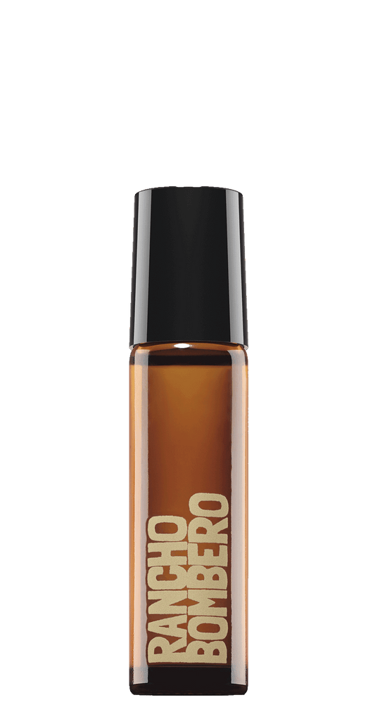 Gender-neutral fragrance roller in desert-toned bottle