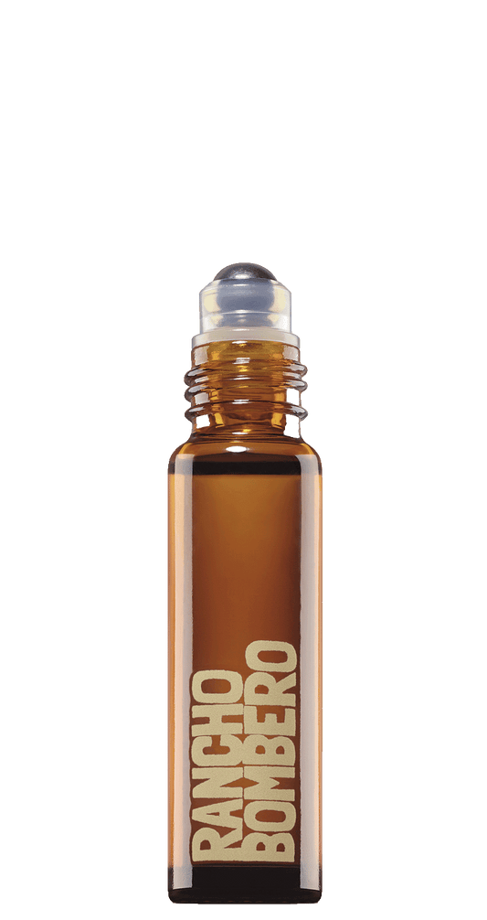 Scent roller bottle with essential oil in amber glass
